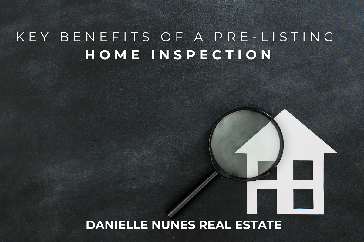 A close-up photo of a house viewed through a magnifying glass, symbolizing a detailed home inspection. Caption: Benefits of a pre-listing home inspection. Danielle Nunes Real Estate.